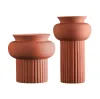 كما تم إعداد مجموعة من أدوات الزينة في شكل أزهار خزفية جافة Specification image